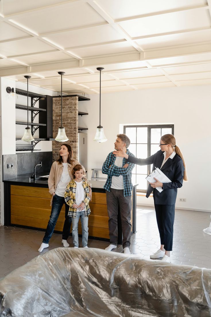 Family inspecting Home